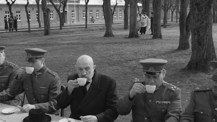 Military sitting down and having tea during Nova Lituania